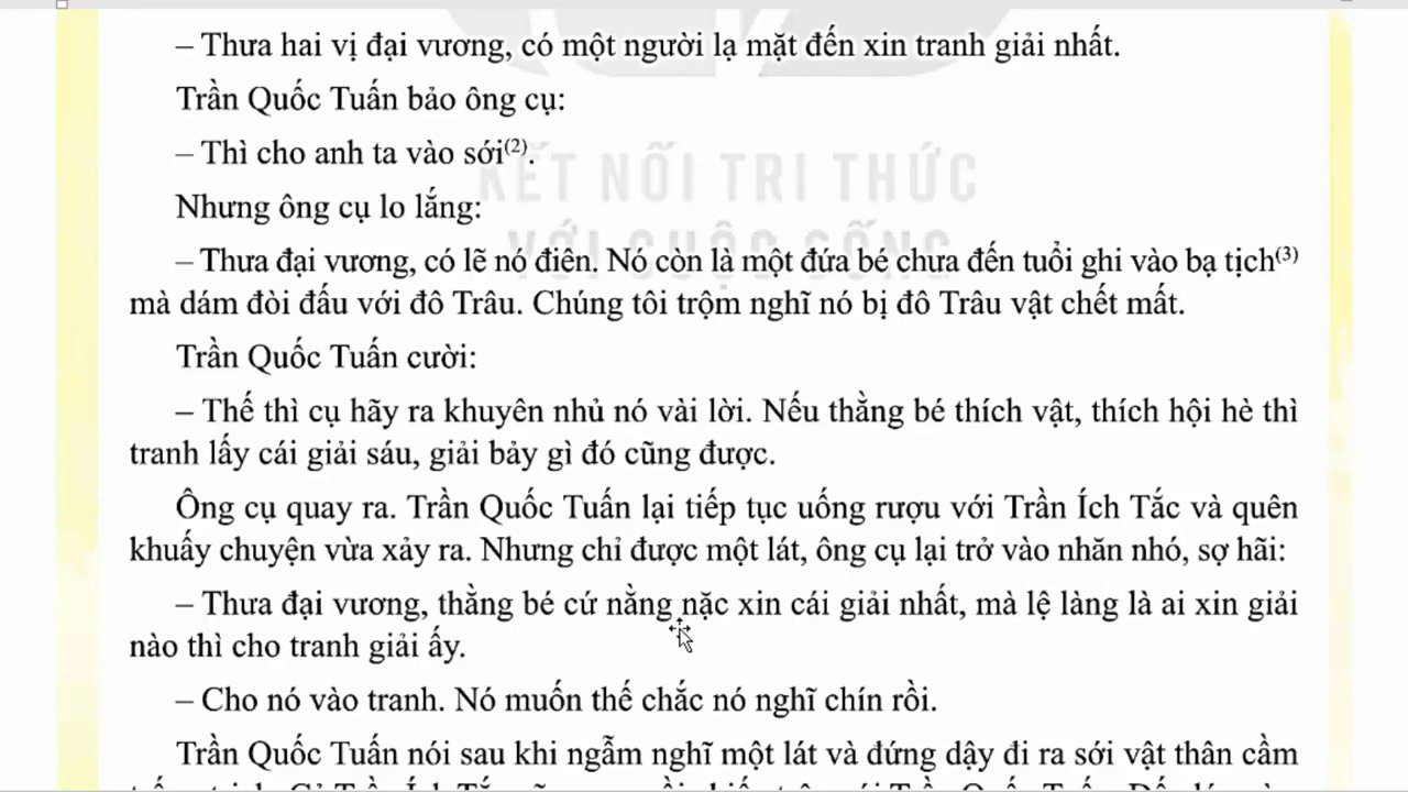 Không khí náo nhiệt của một hội vật truyền thống với đông đảo người xem cổ vũ.